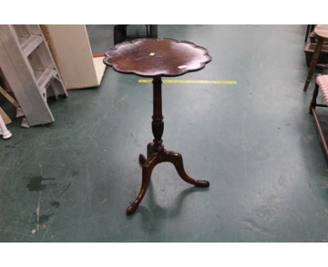 Mahogany tripod table with shaped edge