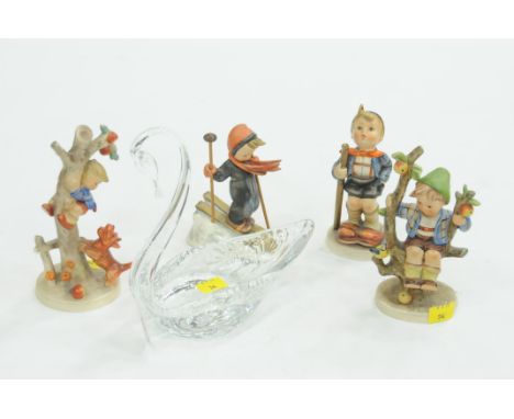 Glass swan ornament and four Hummel figurines