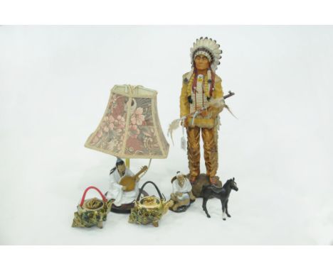 Figure of a Native American, Beswick black foal, two shell teapots, oriental figure and an oriental lamp