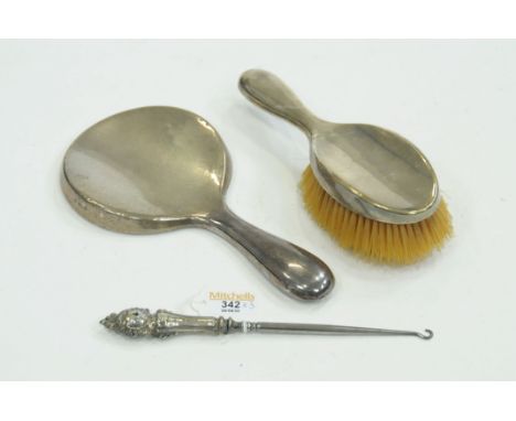 Silver button hook and Birmingham silver backed mirror and brush