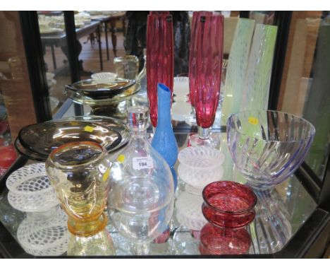 Two Teign Valley white trailing glass bowls, another in red and a blue vase, a pair of Dartington red glass vases, a Caithnes