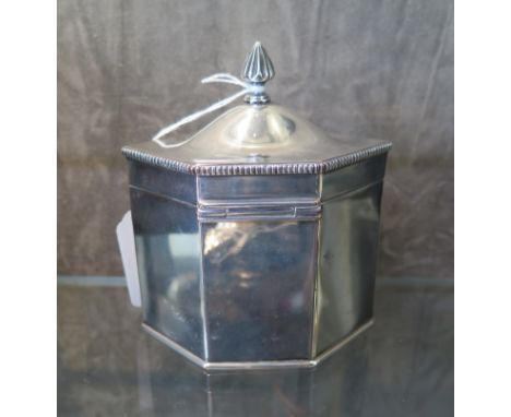 A silver on copper hexagonal tea caddy, with hinged beaded lid, 11cm high 10cm wide