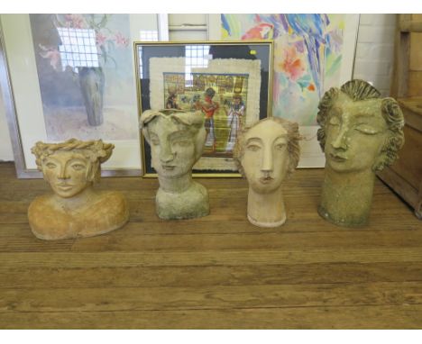 Four terracotta plant pots in the form of portrait busts, largest 55cm high (4)