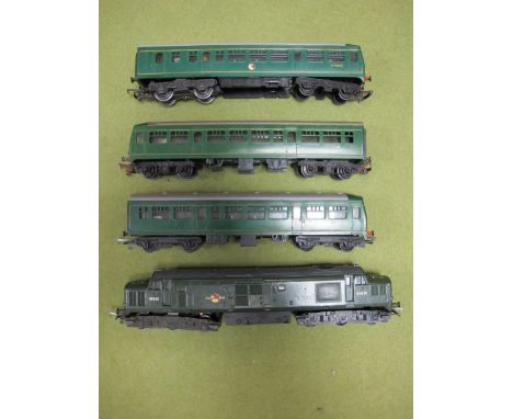 A Tri-ang "OO" Scale Two Car DMU, plus a spare dummy car and a Tri-ang/Hornby class 37 diesel. All playworn. 