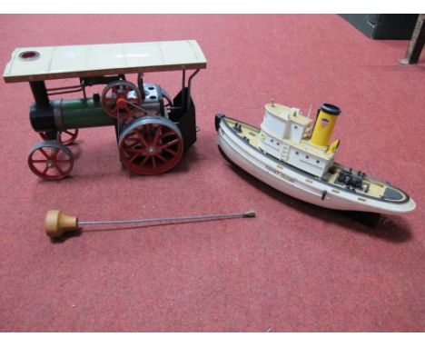 A Mamod TE1A Live Steam Traction Engine, with whistle, canopy and steering extension rod, together with a motorised plastic A