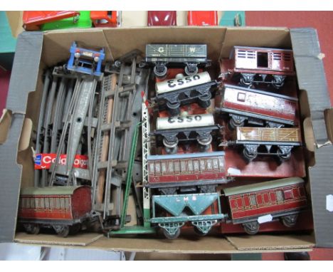 A Box of Mainly Post War "O" Gauge Four Wheeled Wagons and Coaches, plus other associated items.