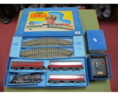 A Post War Hornby Dublo Three Rail Set, comprising 2-6-4 standard tank and three coaches, British rail finish, playworn, boxe