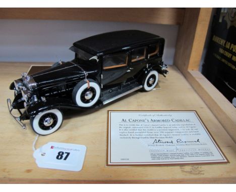 A Franklin Mint 1:24th Scale Diecast 'Al Capone's Armored Cadillac (1930), model is in good condition with briefcase, Tommy g