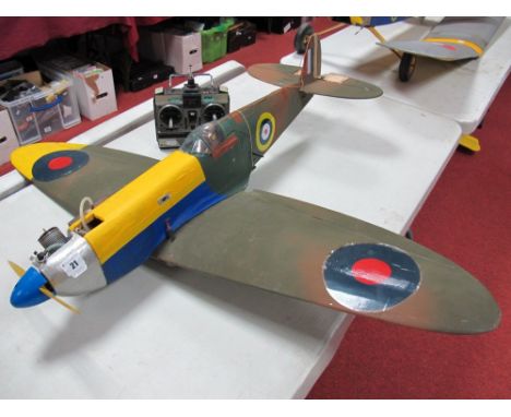 A Radio Controlled Scale Model of a Spitfire Fighter Aircraft, fitted with an MDS 25 glow engine, Sanwa receiver, throttle an