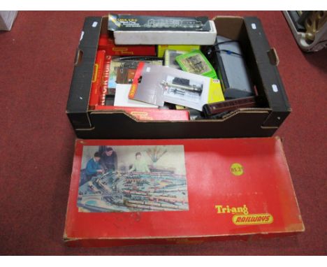 A Tri-ang Clockwork Train Set, an LMS 4-6-0 Black Five, repainted, empty model railway boxes, "OO" scale accessories among ot