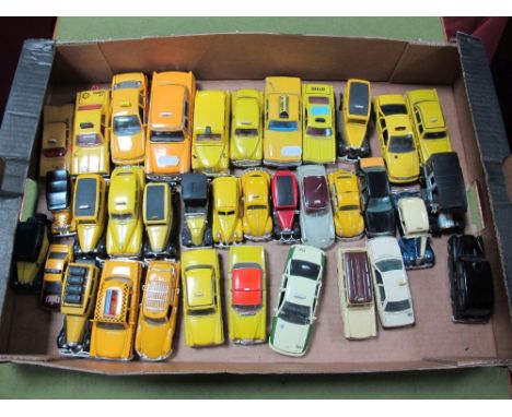 A Quantity of Unboxed Modern Diecast Taxis, predominately yellow cabs, British, European and American taxis noted, by Solido,