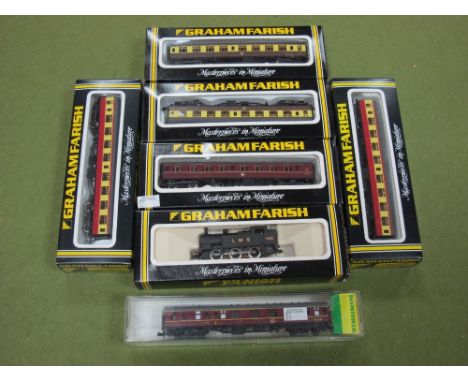 A Boxed Graham Farish N gauge 0-6-0 General Purpose Tank Engine #7313, in LMS black. Together with five boxed Graham Farish c