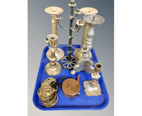 A tray of brass candlesticks, horse brasses, miniature copper watering can, pewter pricket candlestick etc 