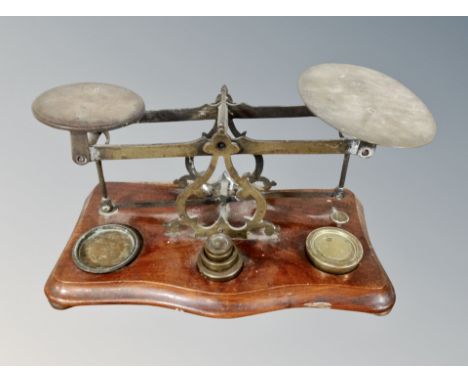 A set of 19th century postal scales with weights 