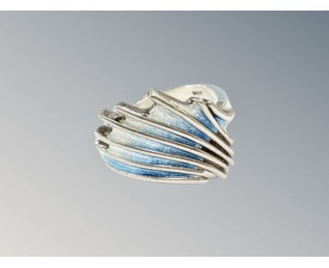 A silver and enamel ring