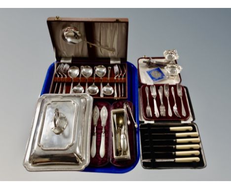 A silver plated entrée dish, quantity of silver plated flatware 