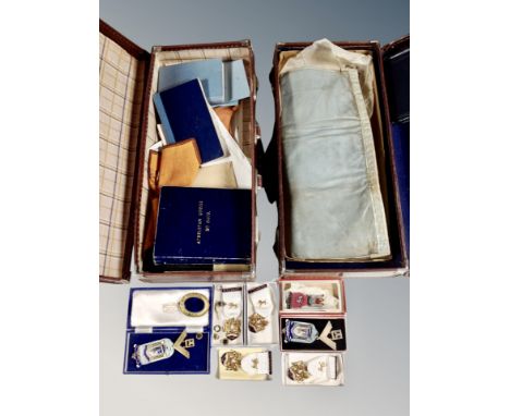 A collection of Masonic memorabilia, two cases, booklets, lodge sash, two silver enamelled medals etc 