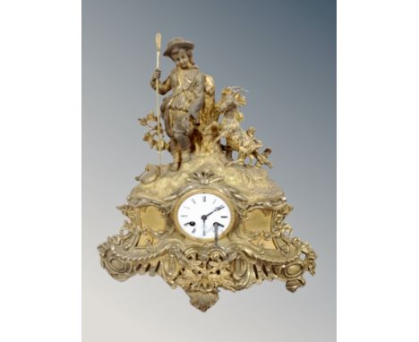 A 19th century gilt metal figural mantel clock, with enamelled dial, height 42 cm  CONDITION REPORT: With pendulum 