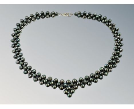 A black cultured pearl necklace 