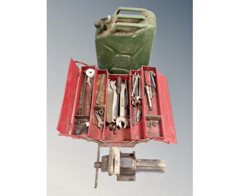 A concertina tool box, jerry can and bench vice 