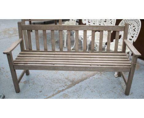 GARDEN BENCH, weathered teak of slatted construction, stamped 'Wrench, England', 157cm W.