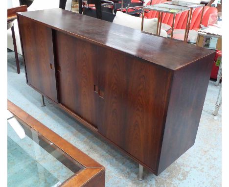 1960'S SIDEBOARD, with three sliding doors and fitted interior on metal tubular supports, 165cm x 44cm x 80cm H. (slight faul