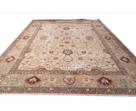 ZEIGLER CARPET, floral design on a cream and rustic ground, 400cm x 301cm.