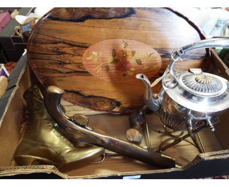 A silver plated spirit kettle and bread fork, a brass ladies boot, a coromandel wood marquetry tray and a wirework tray