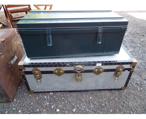A green painted tin trunk and another