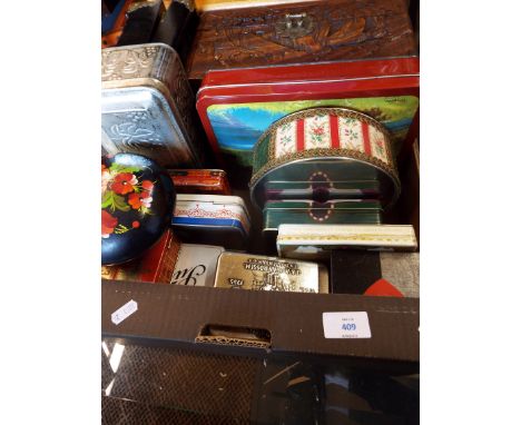 A selection of assorted trinket and jewellery boxes and advertising tins