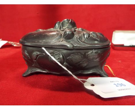 An early 20thC pewter trinket box with hinged lid in Art Nouveau design, marked '125' to base