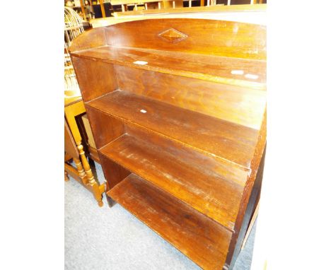 A 1940s/50s oak free standing four shelf bookcase