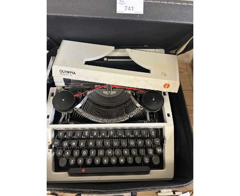 An Olympia typewriter, cased