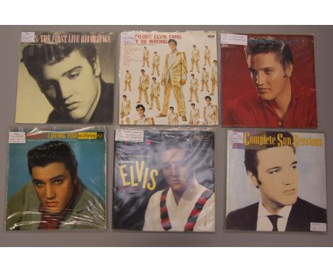 32 Elvis Presley Records including "Loving You" USA, "First live record" German, "Essential Elvis Vol. 2" - silver spot volum