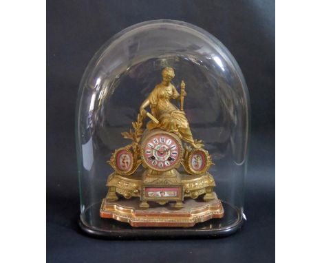 French Ormolu Eight Day Striking Mantle Clock.  In the form of a  seated Lady holding Torch and Book.  Enamelled 8cm dial.  O