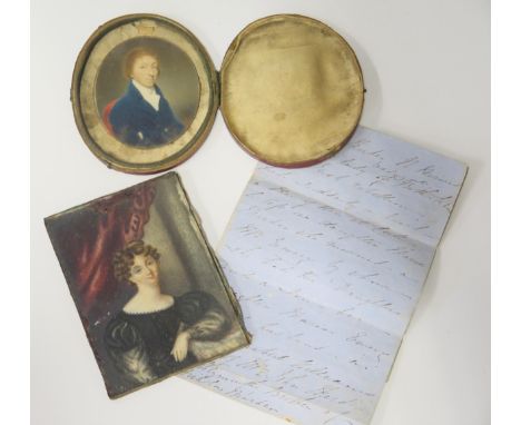 A Georgian Miniature Portrait of a Gentleman behind glass (7x6cm) and another of a young lady behind glass (11x8cm) with acco