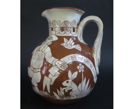 A Studio Pottery Jug with incised decoration of a couple dancing "BE MERRY BE BRIGHT MAY YOUR FOOTSTEPS BE LIGHT", 20cm 