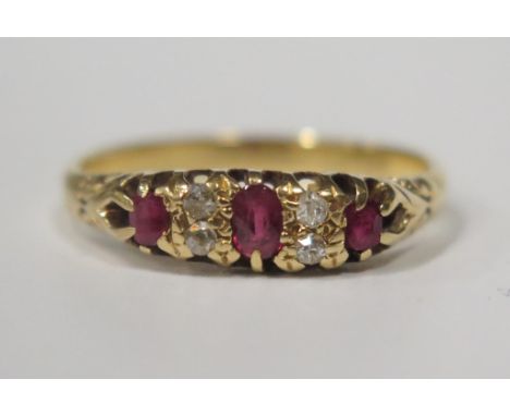 An 18ct Yellow Gold, Ruby and Diamond Seven Stone Ring, size P.5, 3.4g 