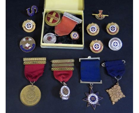 A Collection of Girls' Life Brigade Enamel Badges, 'Good Service' medallions, etc. 