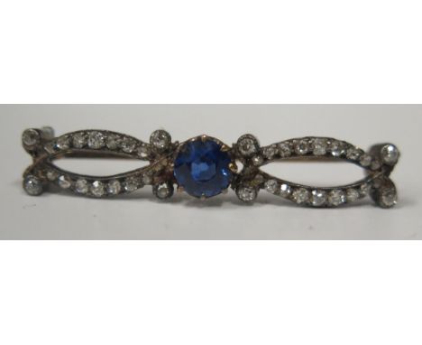 A Victorian  Mappin &amp; Webb Cased Sapphire and Diamond Brooch, 5.7mm central stone, 38mm long, 3.4g 