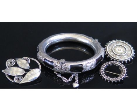 An Asian Hinged Silver Mounted Bangle and three brooches 