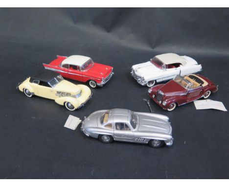 Five Franklin Mint 1:24 Scale Cars Including Chevrolet Belair, Cadillac Elderado, Cord 812, Mercedes 300SC and Mercedes 300SL