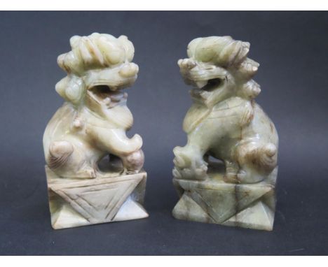 A Pair of Chinese Carved Jade Male and Female Foo Dogs, 13.5cm high 