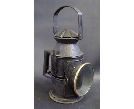 An Indian Railway Lamp marked H.A.G.T.F. BOMBAY, appears intact 