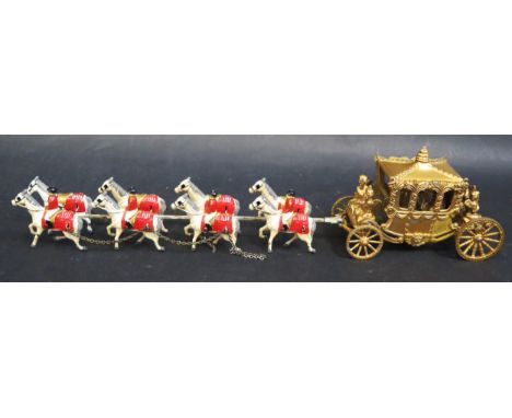 A Lesney Large Scale Coronation Coach, Rare King and Queen Cast, Gold Painted. Fair, coach has been glued together and has ha