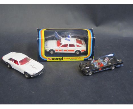 A Corgi 339 Rover 3500 Police Car Very near mint in box plus Batmobile and The Saints Jag Both Playworn 