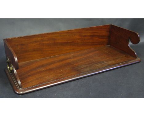A 19th Century Mahogany Book Trough with brass handles, 65cm wide 