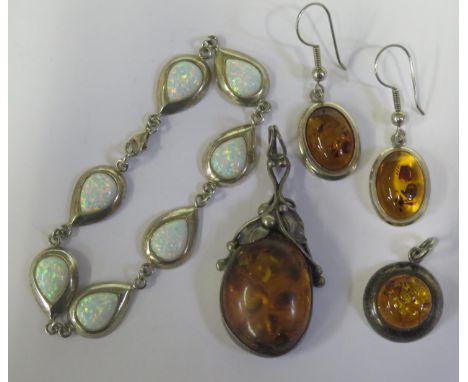 A Selection of Amber and Silver Jewellery (pendant 63mm drop) and a white opal bracelet 