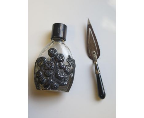 A Sterling Silver Trowel Bookmark with black hardstone handle hallmarked silver mounted perfume bottle 