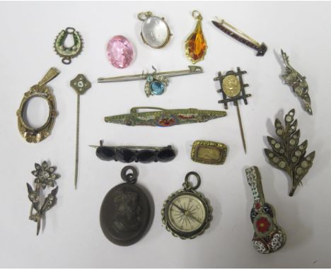 A Selection of Antique Jewellery including a magnifying crystal pendant locket, compass pendant, jet locket, etc. 